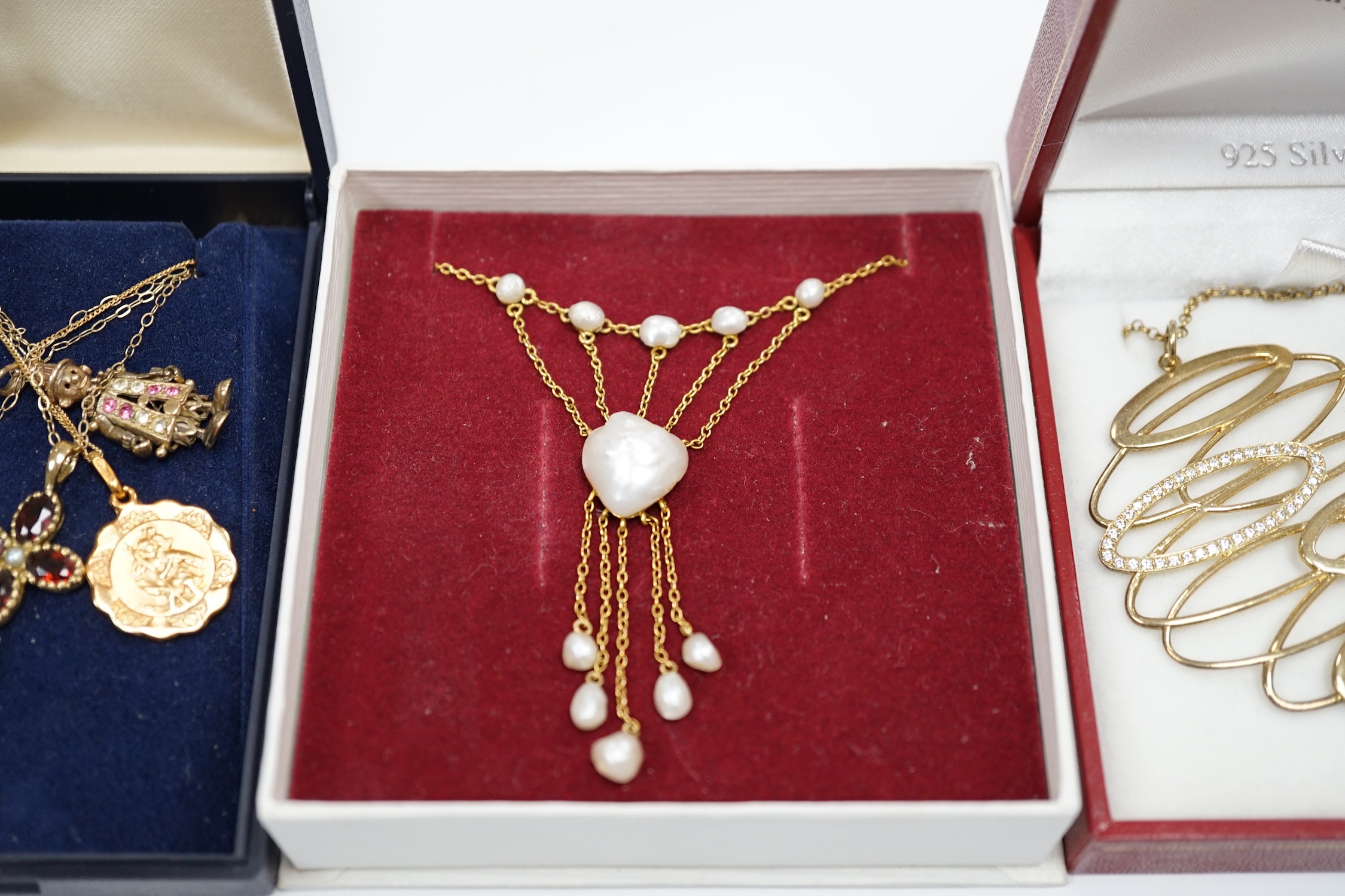 A small quantity of assorted mainly modern 9ct jewellery, including gem set ear studs, baroque pearl necklace, citrine set suite, pendant necklaces including garnet and seed pearl cross, silver gilt pendant necklace, etc